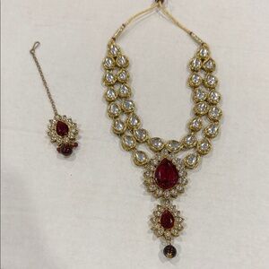Traditional Gold-Tone Necklace Set with Red Gem Accents